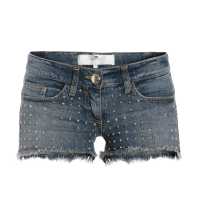 Shorts in denim con applicazioni di borchie