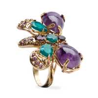 Anello in metallo con pietre a forma di farfalla