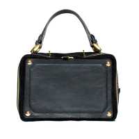 Bauletto in pelle e suède con inserti in metallo dorato